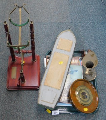 Lot 2276 - A wine bottle stand, together with a barometer,...