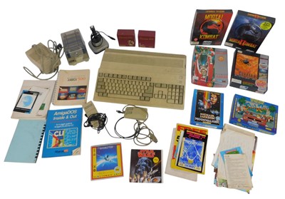 Lot 612 - A Commodore Amiga model A500 computer,...