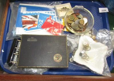 Lot 2226 - World coinage, together with a Bakelite cased...