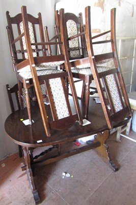 Lot 1092 - An Old Charm dining table, extending, with six...
