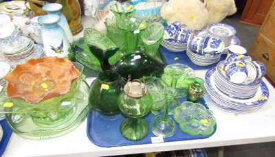 Lot 2134 - A group of green glassware, including vases,...