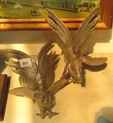 Lot 2022 - Two cast metal fighting cocks.