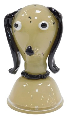 Lot 760 - A glass sculpture of a cartoon dog, possibly...