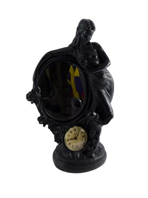 Lot 115 - A Juliana quartz mantel clock, in ebonised...