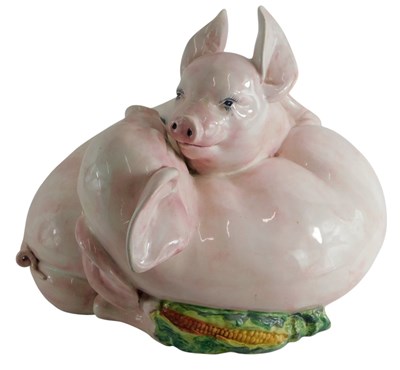 Lot 117 - A pottery group, modelled as two pigs, 36cm wide.