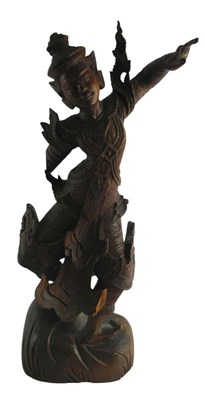 Lot 119 - An Indonesian or Thai carved wooden figure of...