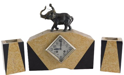 Lot 147 - A French Art Deco clock garniture, the clock...