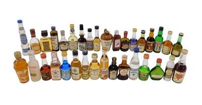 Lot 214 - A quantity of miniature bottles of alcohol, to...