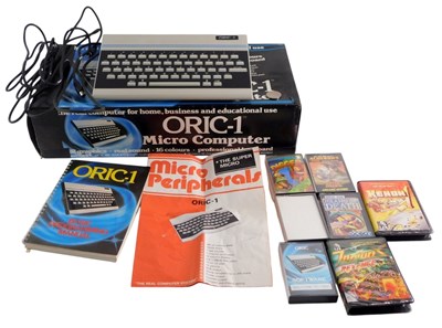Lot 218 - An Oric-1 micro computer, and some games. ...
