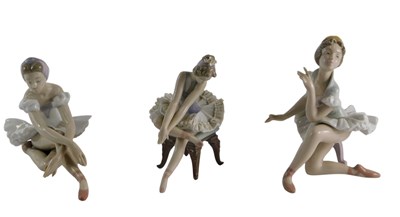 Lot 225 - A Lladro porcelain figure of a seated...