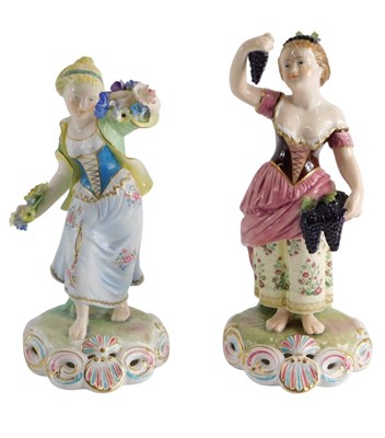 Lot 610 - A pair of Continental porcelain figures, in...