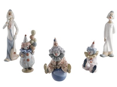 Lot 261 - Three Lladro porcelain clown figures, each in...