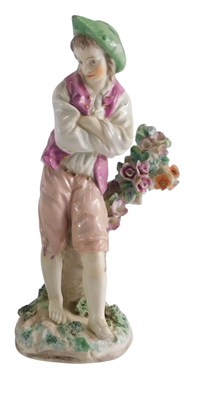 Lot 272 - A 19thC English porcelain figure of a man,...