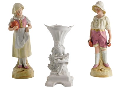 Lot 283 - A pair of German bisque porcelain figures, of...