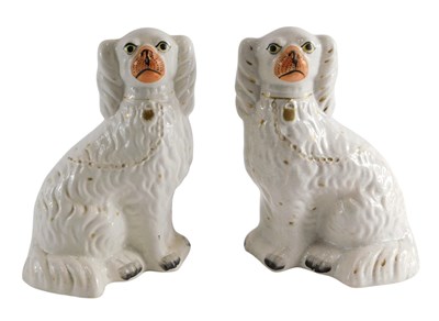 Lot 252 - A pair of 19thC Staffordshire Spaniels, each...