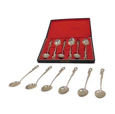 Lot 309 - A set of twelve white metal souvenir...