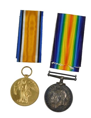 Lot 399 - Two WWI medals, named around the edge to...