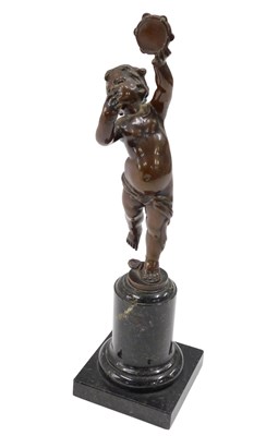 Lot 8 - A 19thC bronze figure of a putto, on a...