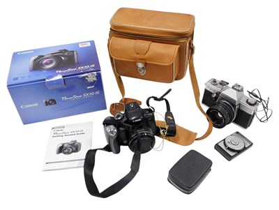 Lot 456 - A Canon Powershot SX10 IS digital camera,...