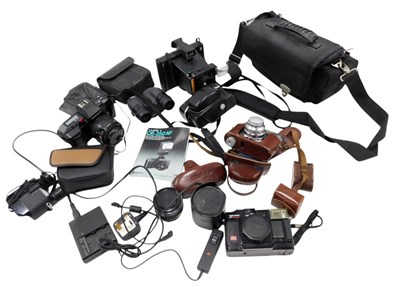 Lot 457 - A quantity of camera equipment, to include a...