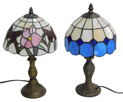 Lot 653 - Two Tiffany style table lamps, each with a...