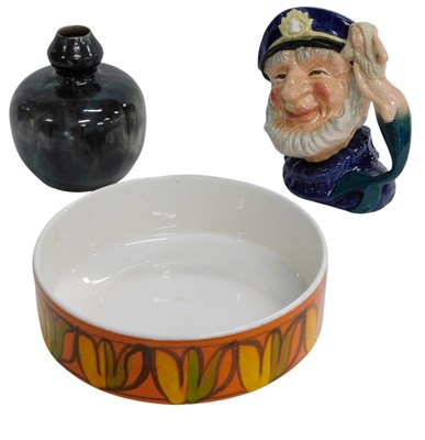 Lot 656 - A Poole pottery bowl, decorated with abstract...