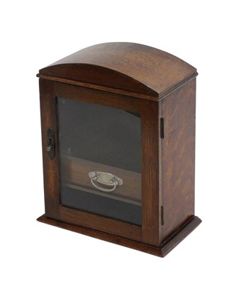 Lot 667 - An early 20thC oak smoker's cabinet, the...
