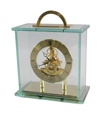 Lot 574 - A Seiko mantel timepiece, with skeleton...