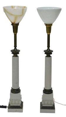 Lot 575 - A pair of Continental ceramic and gilt metal...