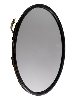 Lot 606 - An early 20thC black Japanned oval wall mirror,...
