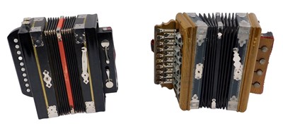 Lot 629 - A German ebonised piano accordion, and a...
