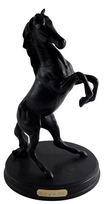 Lot 639 - A Royal Doulton black matte glazed figure of a...