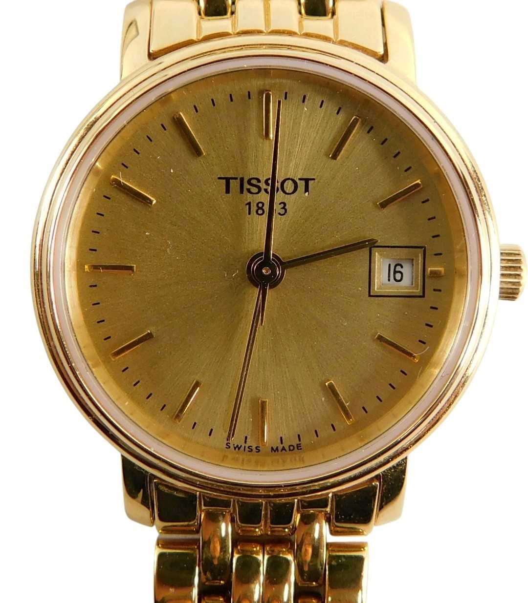Lot 69 - A Tissot ladies gold plated wristwatch,...