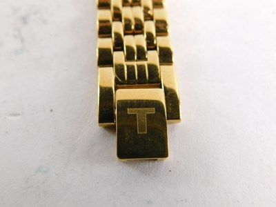 Lot 69 - A Tissot ladies gold plated wristwatch,...