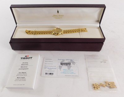 Lot 69 - A Tissot ladies gold plated wristwatch,...