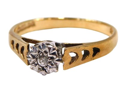 Lot 86 - A 9ct gold and diamond solitaire ring, in an...