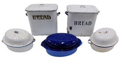 Lot 644 - A white and navy blue enamel bread bin and...
