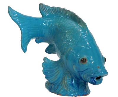 Lot 646 - A large pale blue glazed model of a...