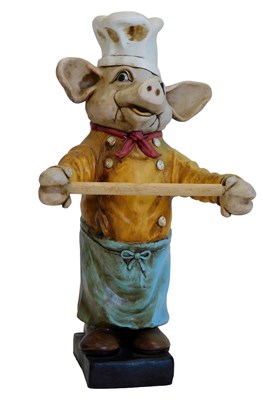 Lot 650 - A painted composition model of a pig, used as...