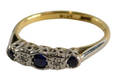 Lot 73 - A sapphire and diamond five stone ring, the...