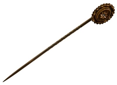 Lot 72 - A diamond set tie pin, in yellow metal,...