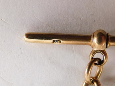 Lot 74 - A 15ct gold oval link Albert chain, with t bar...