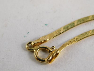 Lot 77 - A 9ct gold textured fringe necklace, on a bolt...