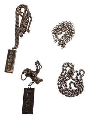 Lot 97 - Two silver ingot pendants, with neck chains,...