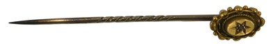 Lot 376 - A Victorian diamond set tie pin, in yellow...