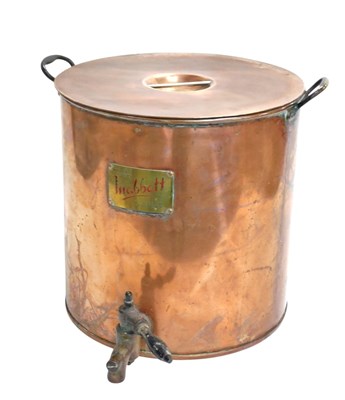 Lot 710 - A copper and brass two handled tea urn, label...