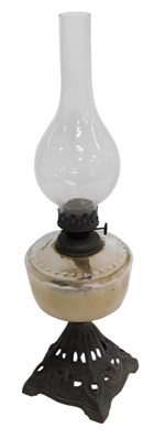 Lot 738 - A Victorian cast iron clear glass oil...