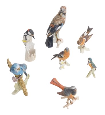 Lot 753 - A Goebel figure of a parrot, a woodpecker, and...