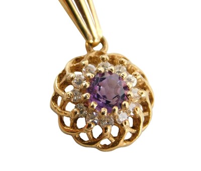 Lot 52 - An amethyst and diamond pendant, in a flower...