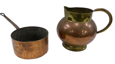 Lot 773 - A large copper and brass flagon, 30cm...